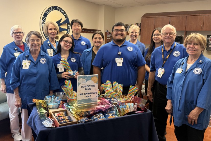 Blue Bird volunteers with an Out of the Blue appreciation table